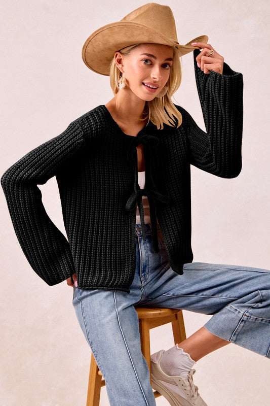 Holly Loose Gauge Knit Sweater With Bow Tie Closure in Black