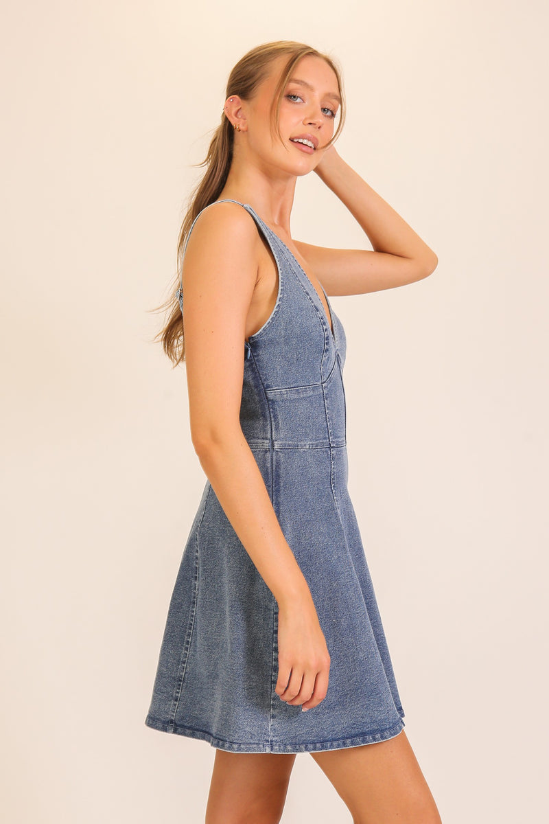 deep v denim dress M.O.T Loose fit Yinx denim dress with deep V-neckline and Tie details | African High Fashion
