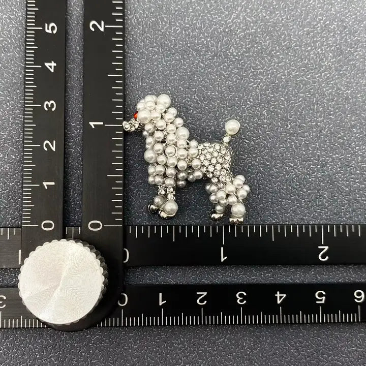 Enamel Brooches in Various Styles