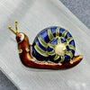 Enamel Brooches in Various Styles